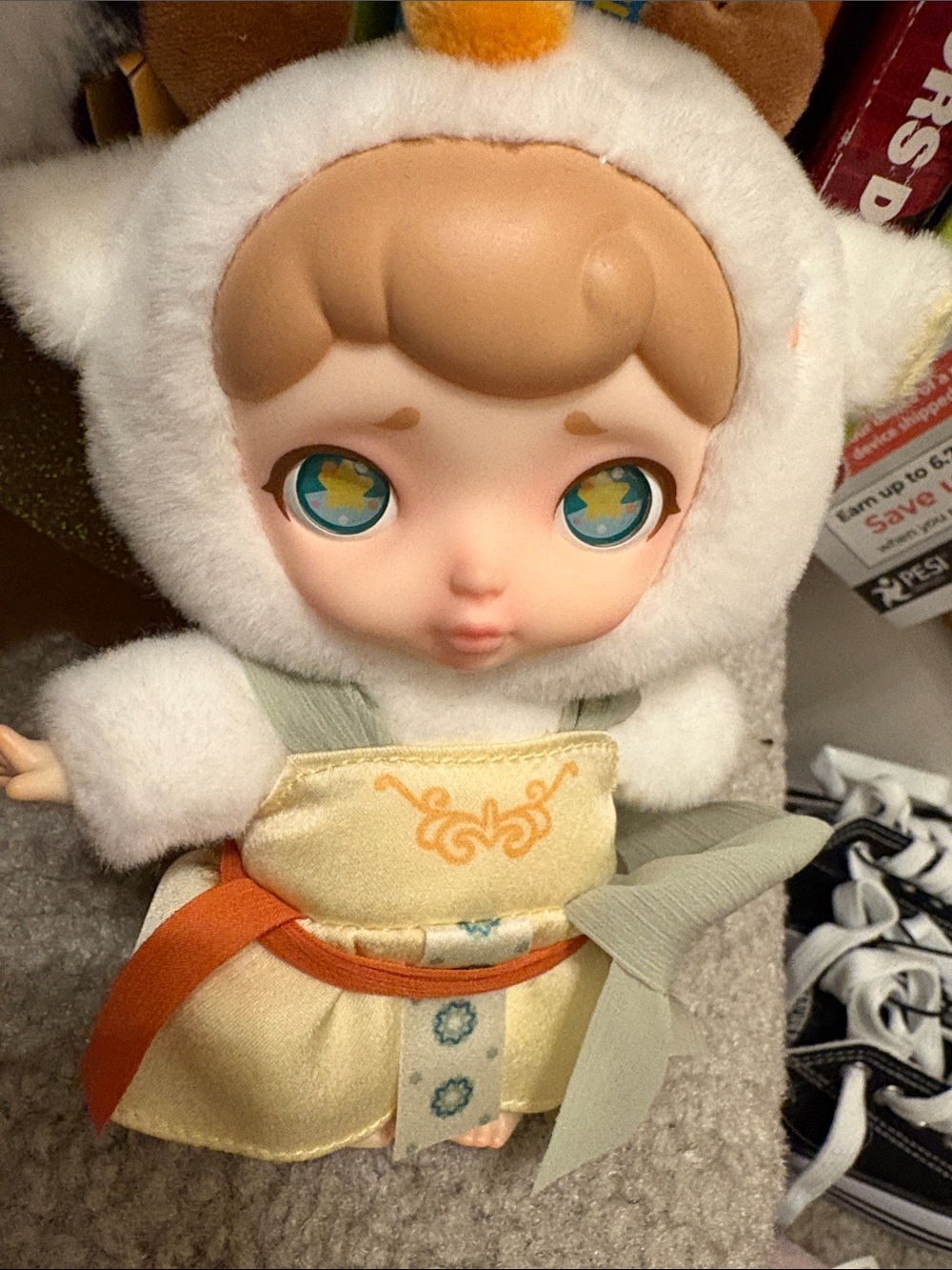 Plush Baby Doll in White Fuzzy Hood with Yellow Dress and Accents